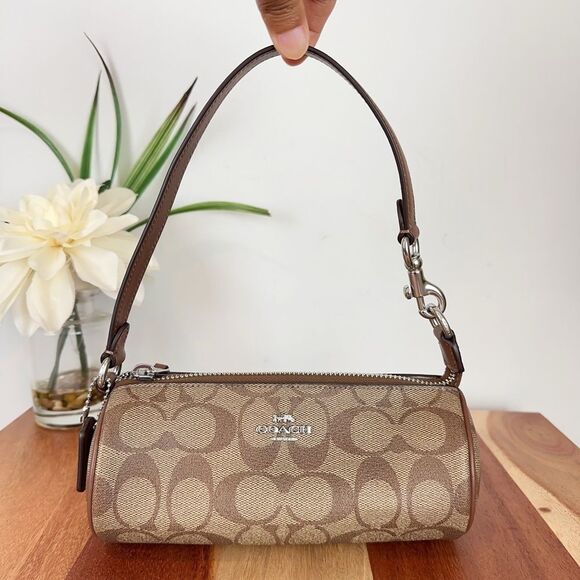 NWT Coach Nolita Barrel Bag In Signature Canvas - Picture 1 of 7